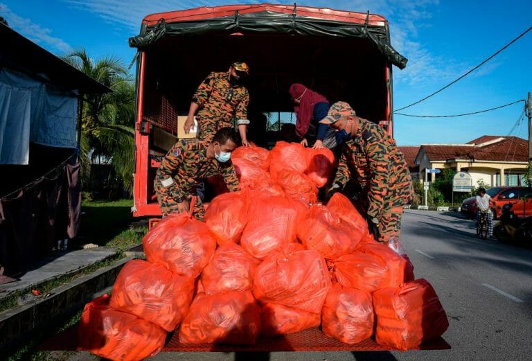 Stagnant floodwaters making it difficult to channel aid to victims